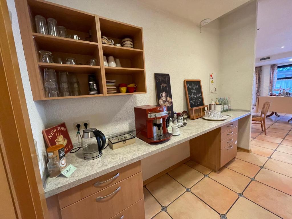 Kuchyň nebo kuchyňský kout v ubytování Hotel Walzwerk