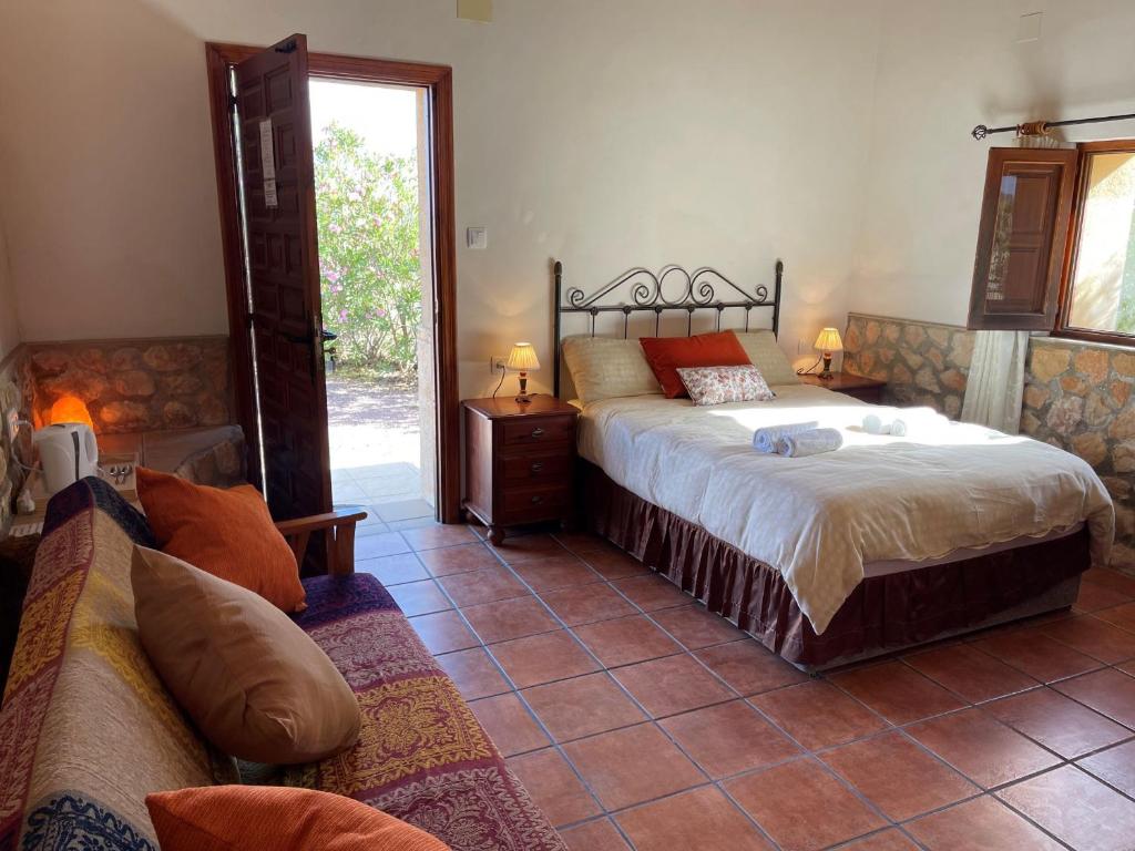 Postel nebo postele na pokoji v ubytování Grapevine Manor