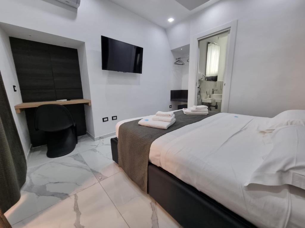 Postel nebo postele na pokoji v ubytování Rooms Vico Giunti