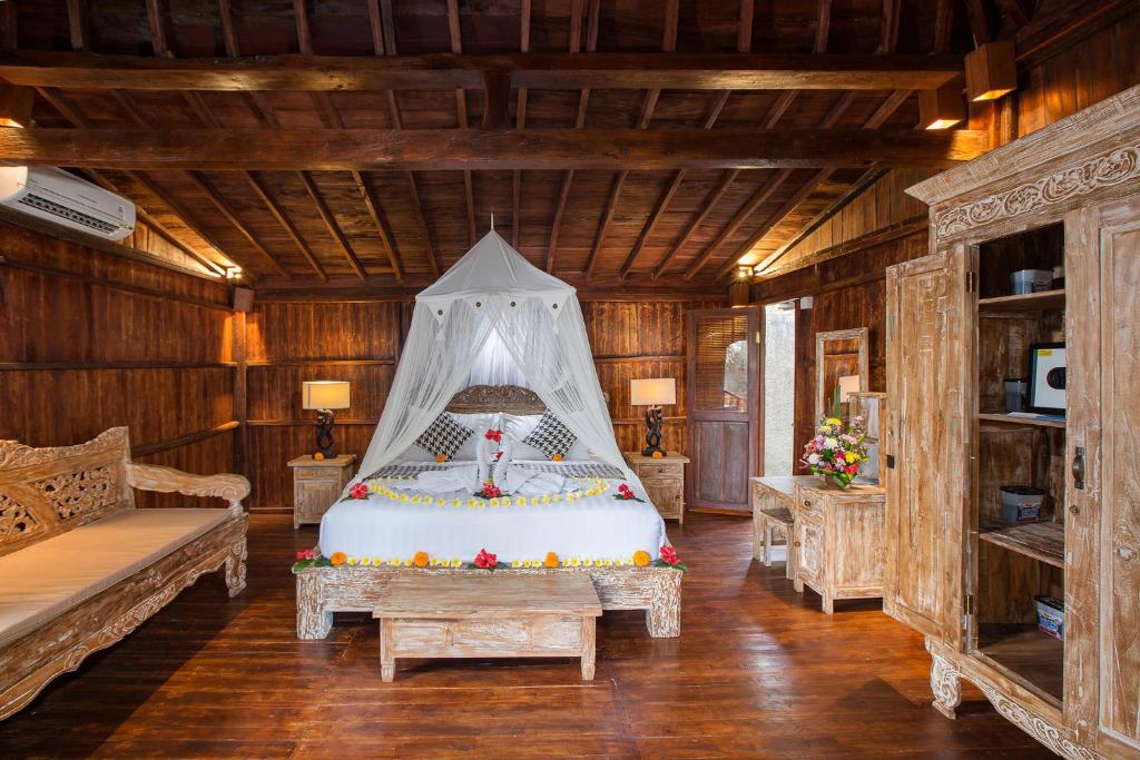 Letto o letti in una camera di The Meranggi