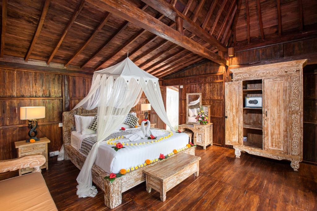 Letto o letti in una camera di The Meranggi