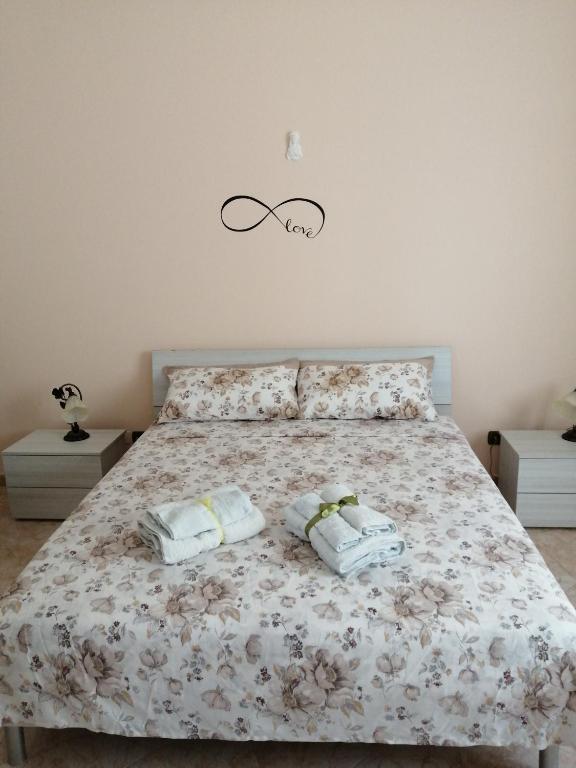 Łóżko lub łóżka w pokoju w obiekcie CASA TRIFO