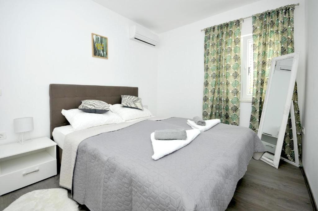 Postel nebo postele na pokoji v ubytování Villa Carolina