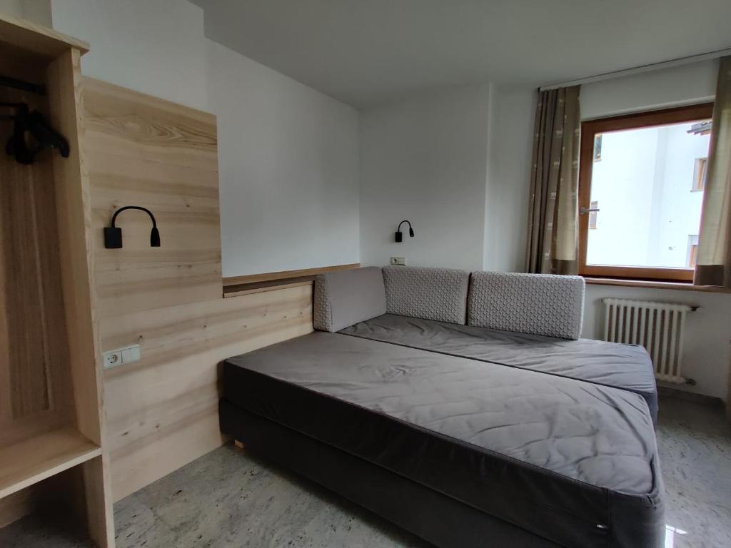 Łóżko lub łóżka w pokoju w obiekcie Eguia