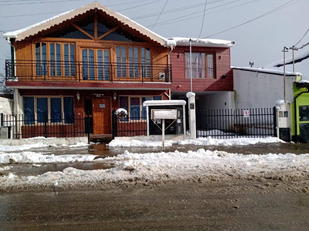 a house with snow in front of it at Polo Austral in Ushuaia
