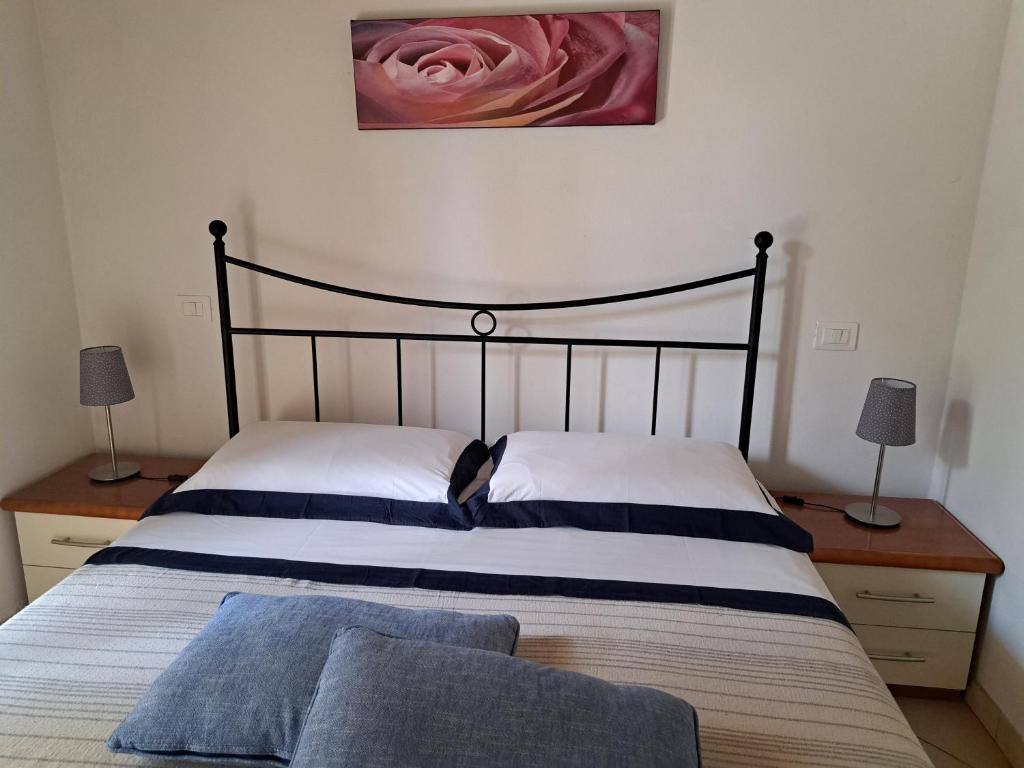 Posteľ alebo postele v izbe v ubytovaní Villetta Pia