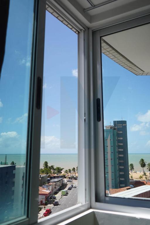 Apto com vista da praia mais bonita da cidade! - 海景公寓