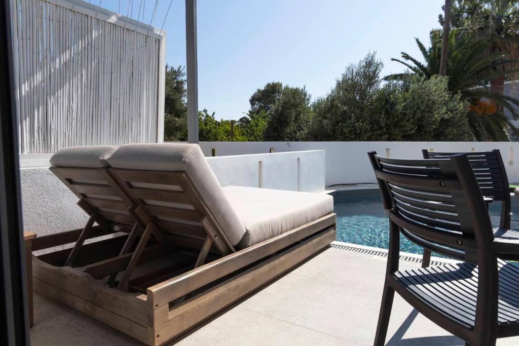The swimming pool at or close to SKYROS BLUE SUITES