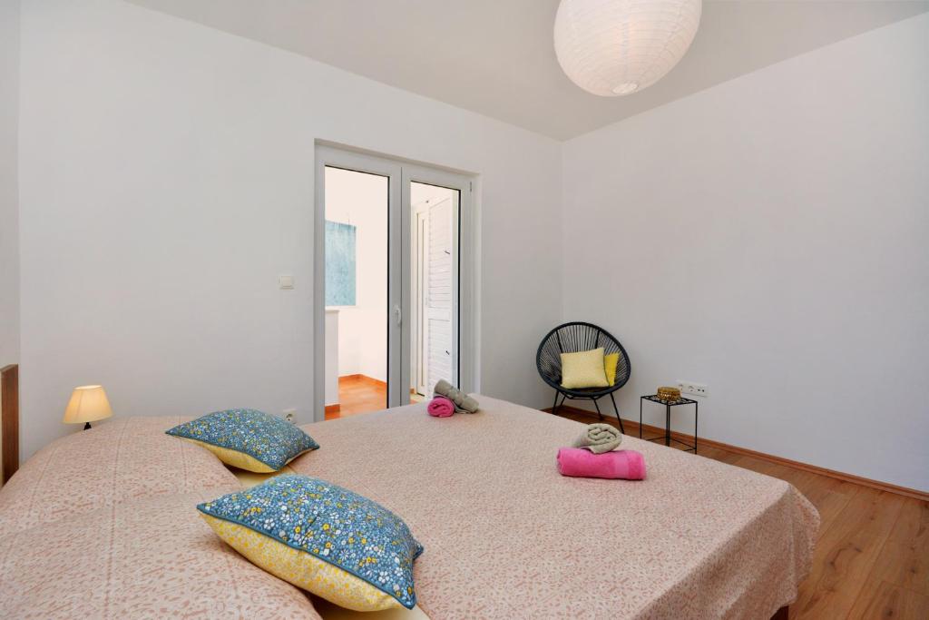 Posteľ alebo postele v izbe v ubytovaní Apartment Wild Rose