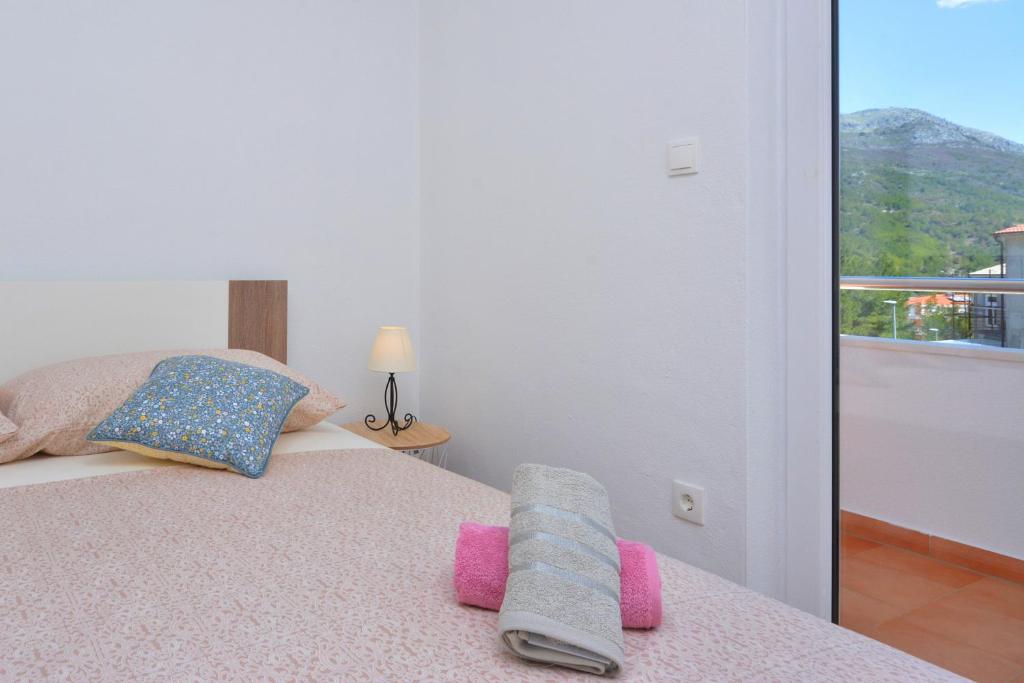 Posteľ alebo postele v izbe v ubytovaní Apartment Wild Rose