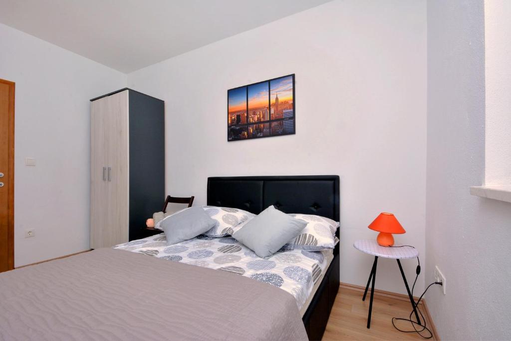 Posteľ alebo postele v izbe v ubytovaní Apartment Wild Rose