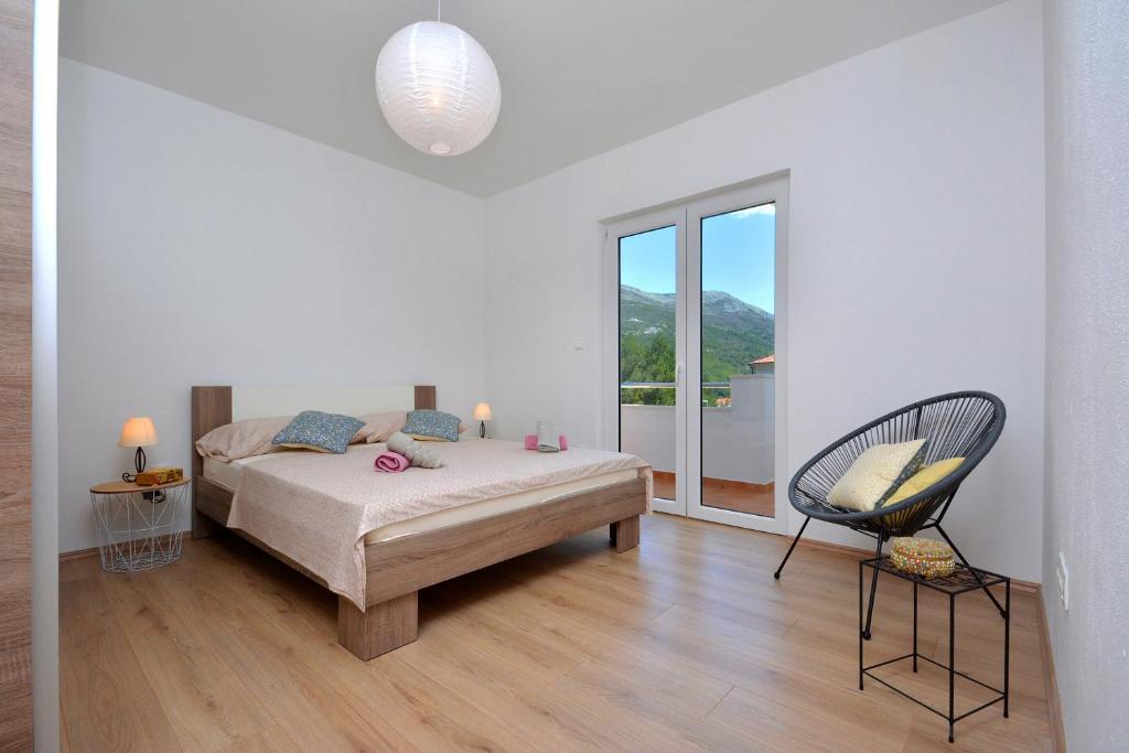 Posteľ alebo postele v izbe v ubytovaní Apartment Wild Rose