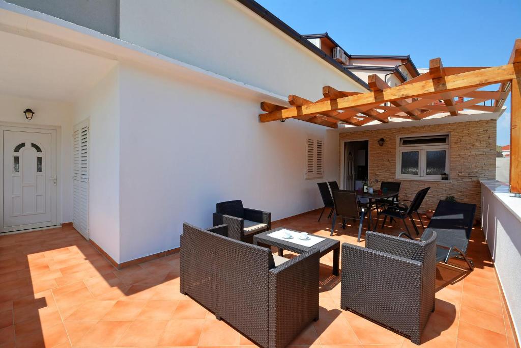 Patio alebo iná vonkajšia časť ubytovania Apartment Wild Rose