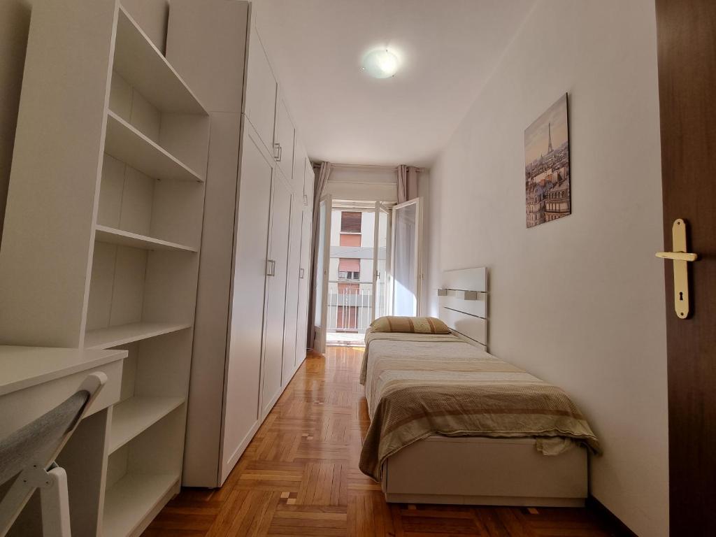 Letto o letti in una camera di Apt by Trieste University