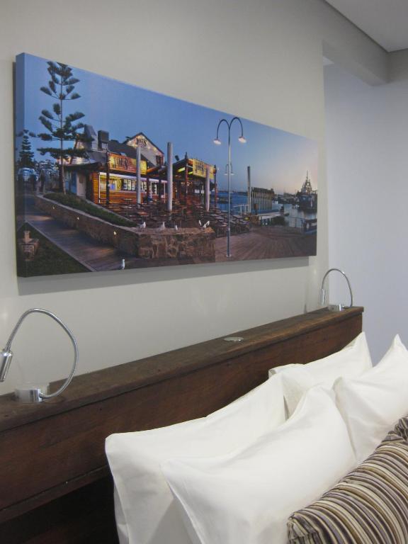 Postel nebo postele na pokoji v ubytování Fremantle Boutique Accommodation - Maand Up