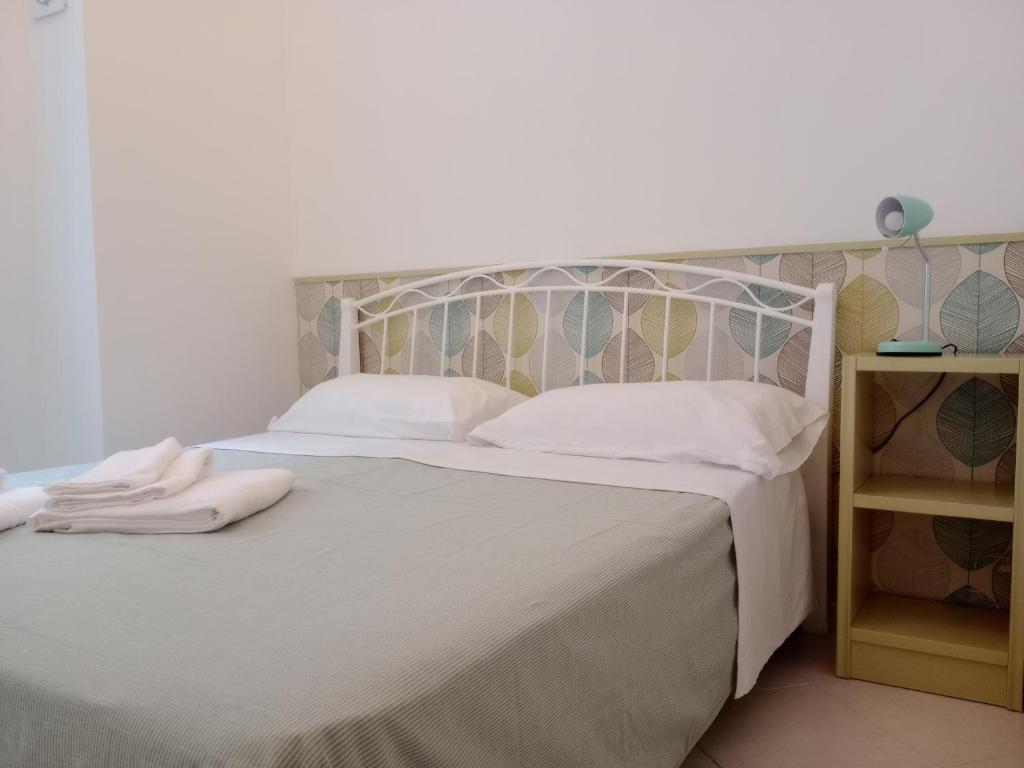 Posteľ alebo postele v izbe v ubytovaní ABBASC O' VASCIO