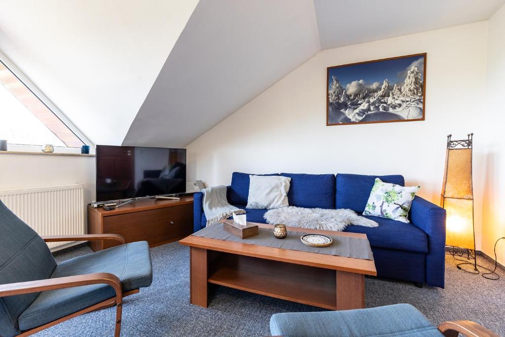 Posezení v ubytování Apartmány nad Šlikovkou