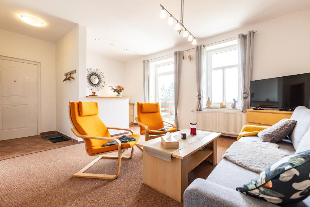 Posezení v ubytování Apartmány nad Šlikovkou