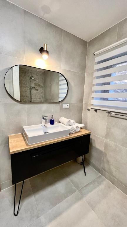 Kúpeľňa v ubytovaní Apartament 21 (1)