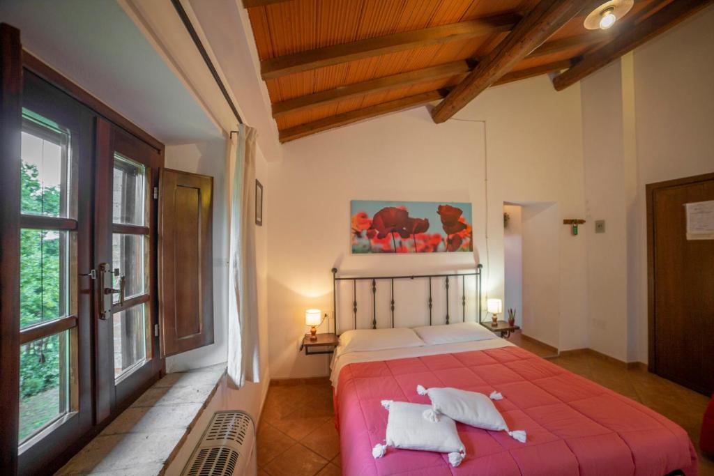 Posteľ alebo postele v izbe v ubytovaní Agriturismo Cappellese