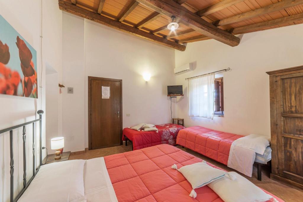Posteľ alebo postele v izbe v ubytovaní Agriturismo Cappellese