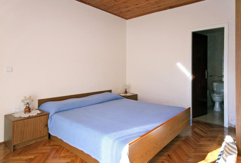 Posteľ alebo postele v izbe v ubytovaní Apartments with a swimming pool Soline, Dubrovnik - 4762