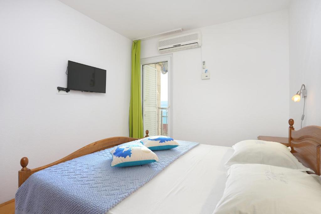 Posteľ alebo postele v izbe v ubytovaní Apartment Duce 2737a