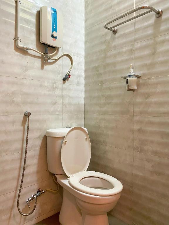 Koupelna v ubytování Best Hotel