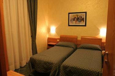 Postel nebo postele na pokoji v ubytování Hotel Blue Rose's