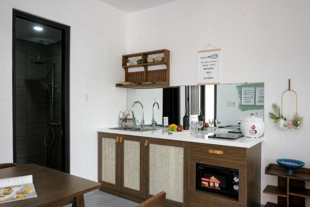 Kuchyň nebo kuchyňský kout v ubytování Quang Vinh Apartment and Hotel Hoi An