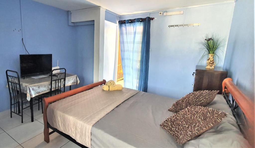 Katil atau katil-katil dalam bilik di Golden Shell Residence