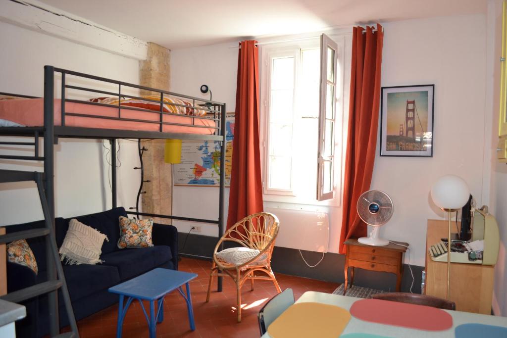 Posteľ alebo postele v izbe v ubytovaní Studio Terrasse Clémentine