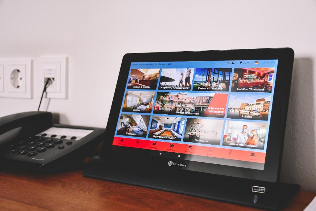 TV a/nebo společenská místnost v ubytování Hotel Hafenresidenz Stralsund