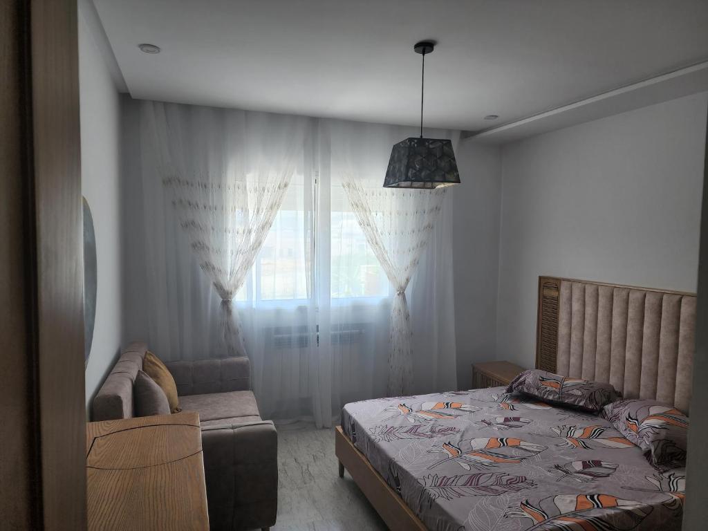 Postel nebo postele na pokoji v ubytování Horizon Appartment - Hammamet Nord