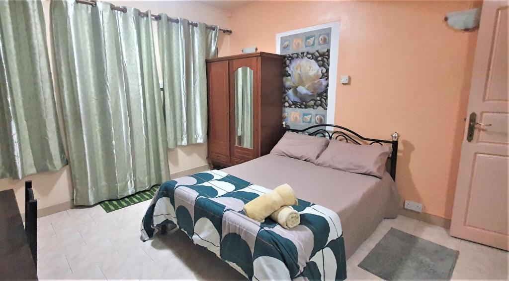 Katil atau katil-katil dalam bilik di Golden Shell Residence