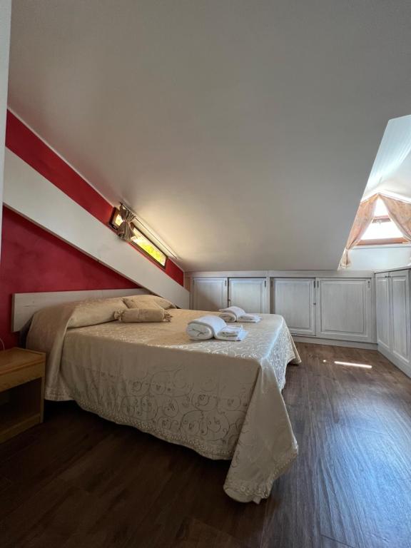 Łóżko lub łóżka w pokoju w obiekcie Casa Hotel Civitella