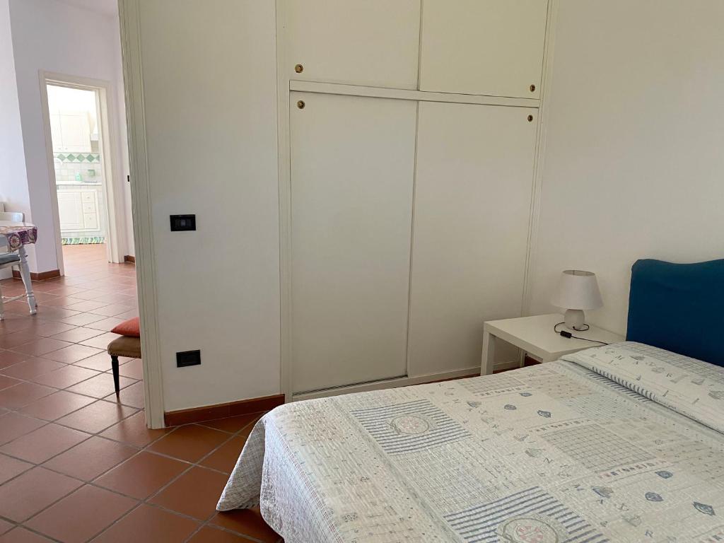 Posteľ alebo postele v izbe v ubytovaní Villa Anna - Appartamento relax 3 minuti a piedi dalla spiaggia