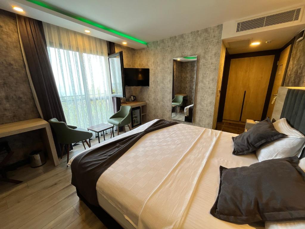 Avni Bey Otel - Tweepersoonskamer Met Uitzicht Op De Tuin