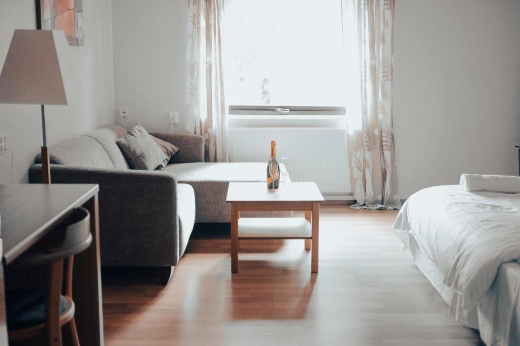 Postel nebo postele na pokoji v ubytování Nadden Hotell & Konferens