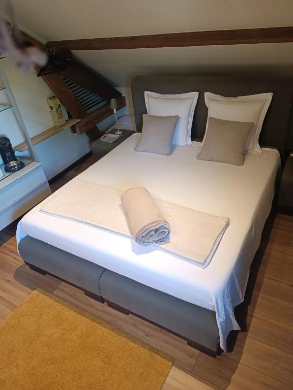 Postel nebo postele na pokoji v ubytování L 'Anima BB & table d'hôte