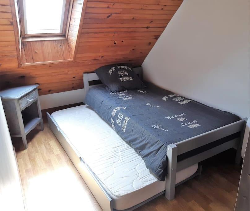 Postel nebo postele na pokoji v ubytování Maison entre Terre et Mer avec Jacuzzi