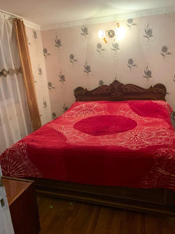 Postel nebo postele na pokoji v ubytování Guest house Mzia