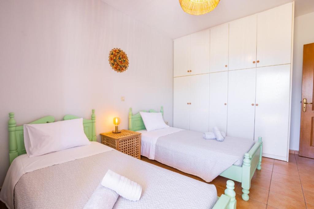 Postel nebo postele na pokoji v ubytování Bonendis - Sea View Apartment