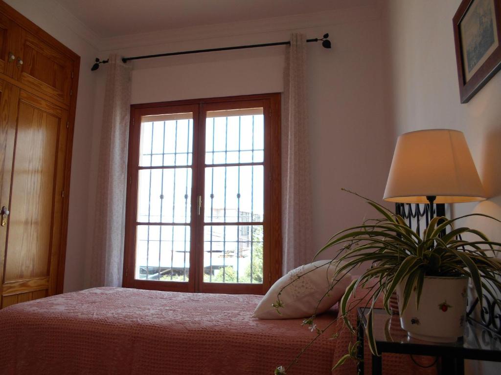 Posteľ alebo postele v izbe v ubytovaní 300-Meter-bis-zum-Strand-Caracola-Wohnung-mit-Garten