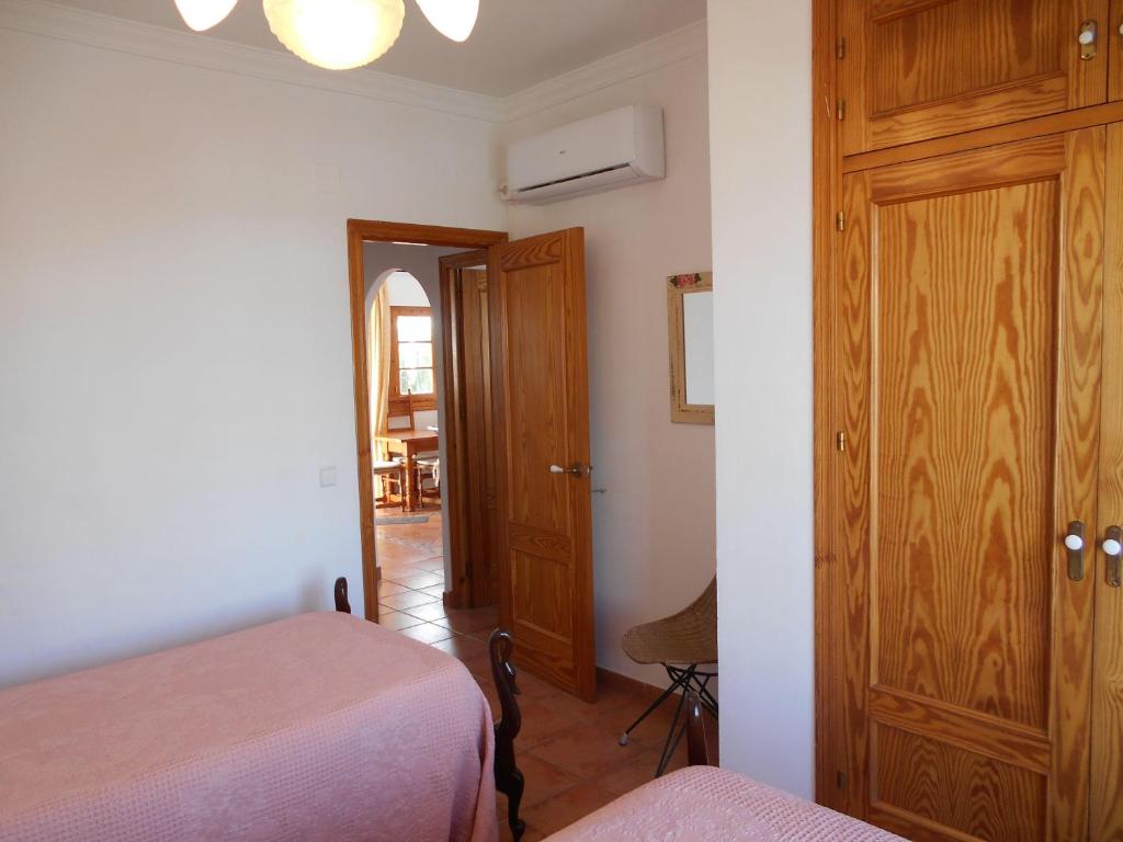 Posteľ alebo postele v izbe v ubytovaní 300-Meter-bis-zum-Strand-Caracola-Wohnung-mit-Garten
