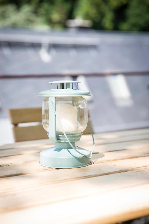 a light sitting on top of a table at Kulturdenkmal Umgebinde1657 in Bad Schandau