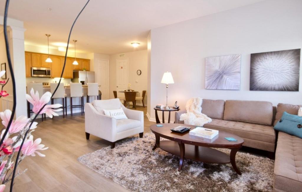 a living room with a couch and a table at Vista Cay Luxury Retreat condo in Orlando