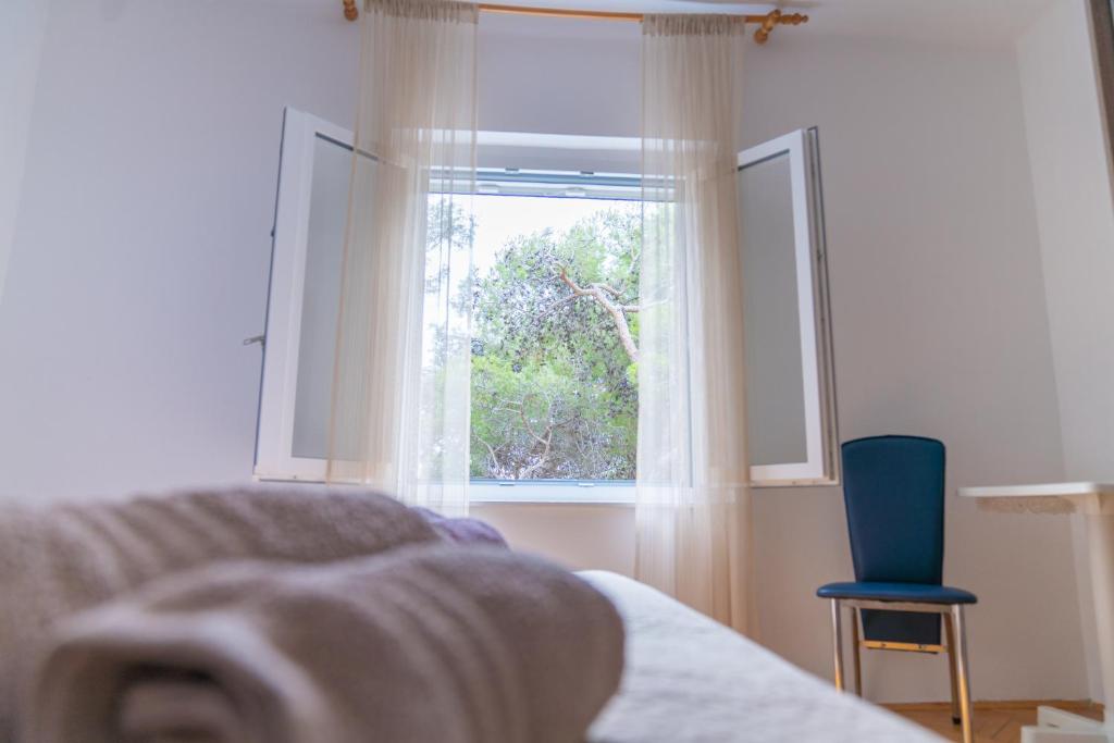 Postel nebo postele na pokoji v ubytování Sidus Maris, Spacious Seaside Apartment with Free Parking