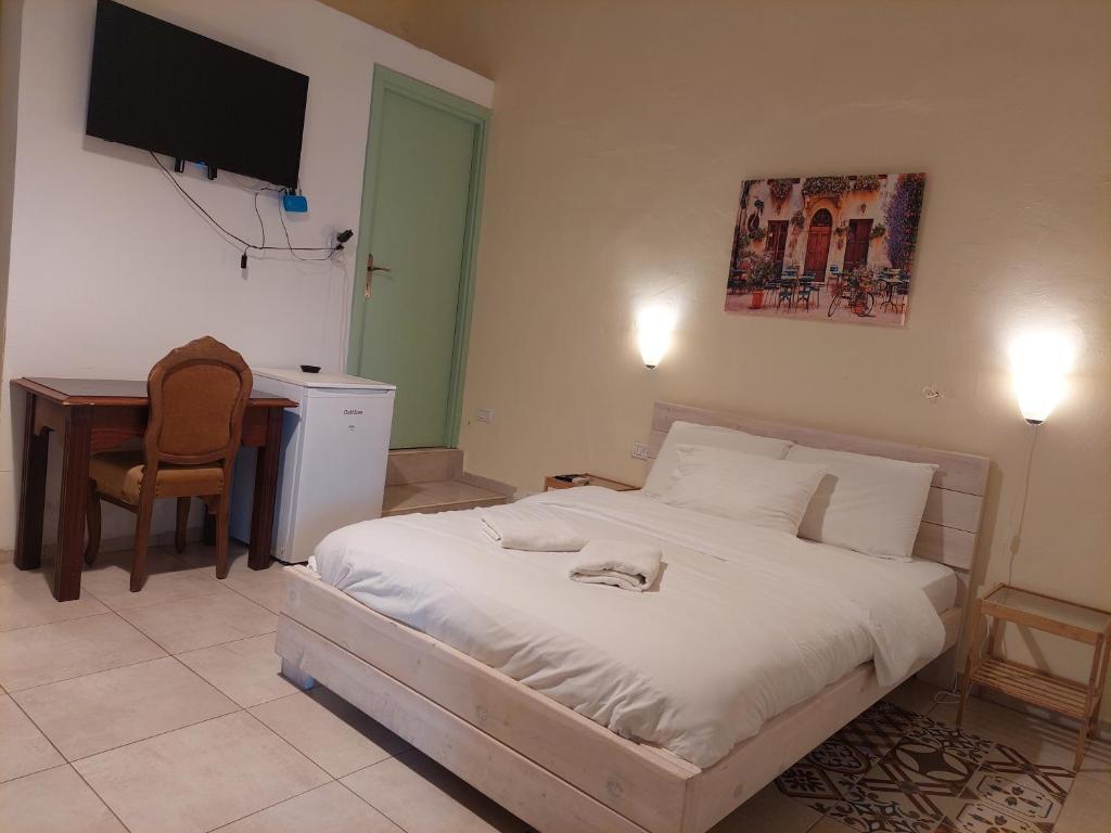 Postel nebo postele na pokoji v ubytování Al Bishara Guest House