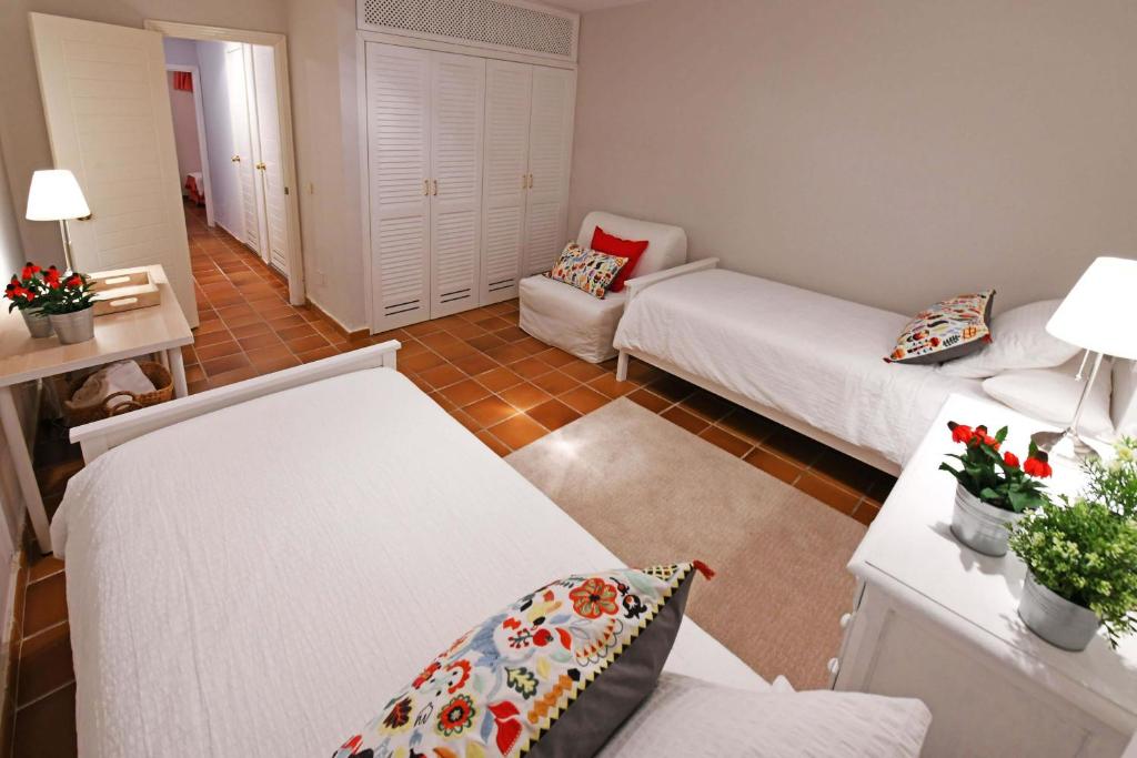 Postel nebo postele na pokoji v ubytování Villa Blue Marlin 8